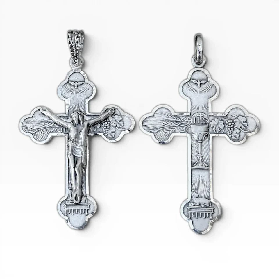 Comparativa de cruz de comunión en plata de ley 925 modelos con Cristo y con símbolos eucarísticos.